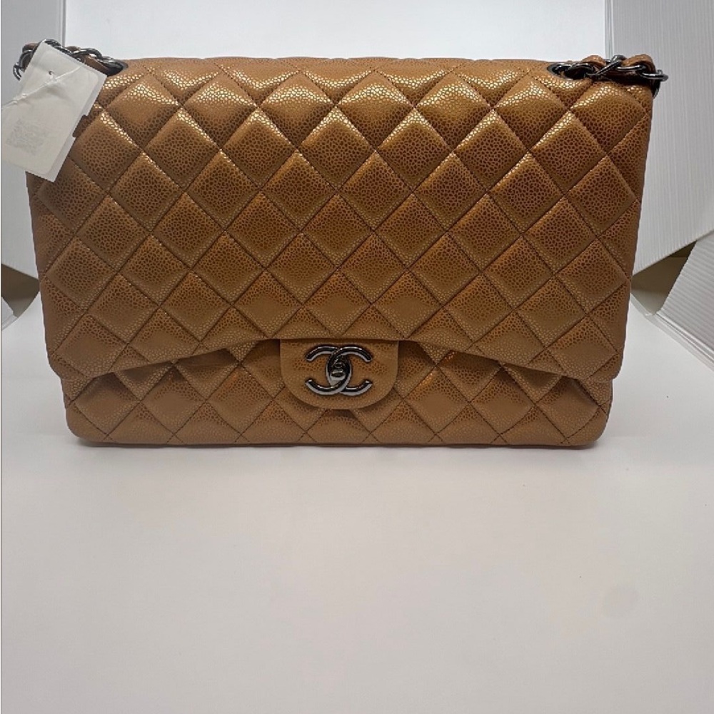 Chanel caviar Maxi double flap in toffee.